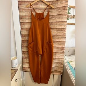 Women’s onesie jumper pants, stretch, orange from Amazon new without tags